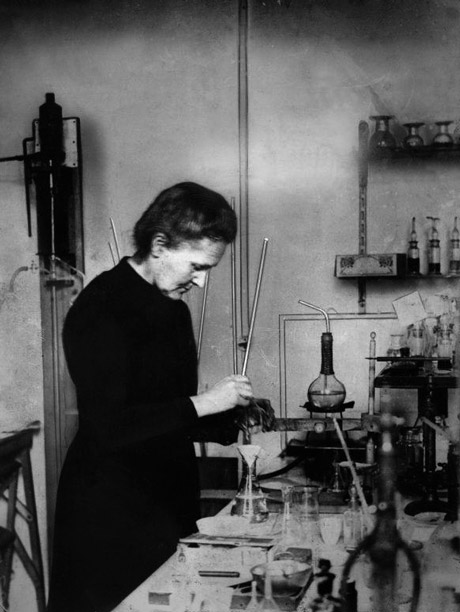 Madame Marie Curie working in her lab.
