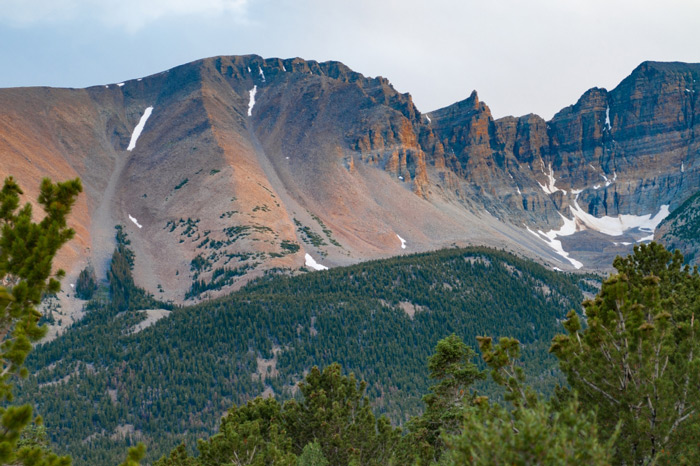 View of the Great Basin National Park mountainous landscape including Wheeler Peak and its glacier, taken from the scenic drive at high elevation above the tree line, near the road's end.