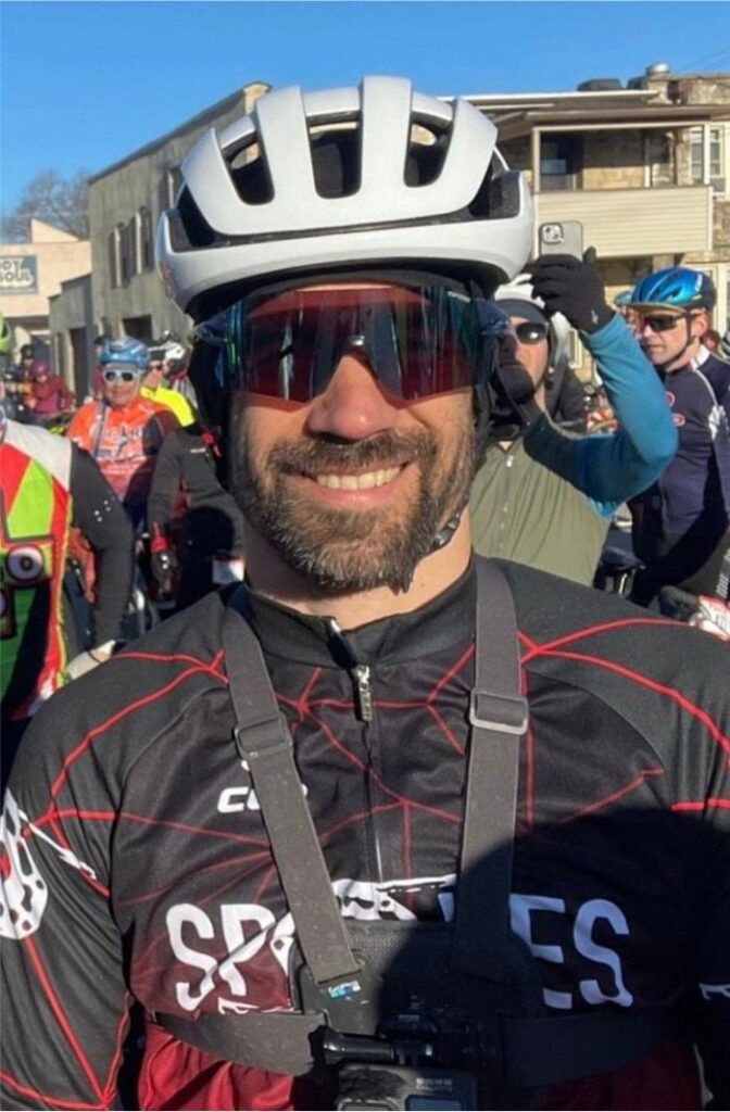 Picture of a Discover All Corners Dad - with a helmet on, from his bike race