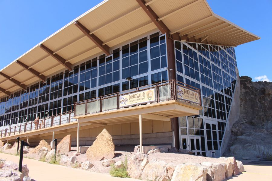 Exterior view of the Quarry Exhibit Hall building at Dinosaur National Monument, Utah, home to a massive dinosaur fossil wall.