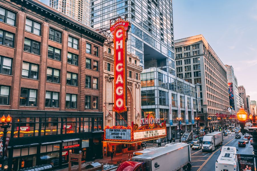 Chicago downtown street with the iconic red Chicago Theater sign.