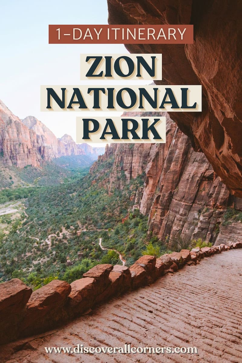A sweeping high-elevation view of the West Rim Trail in Zion National Park, showcasing a lush valley below and expansive red rock canyon walls carved by time. Text overlay - 1 day itinerary - Zion National Park.