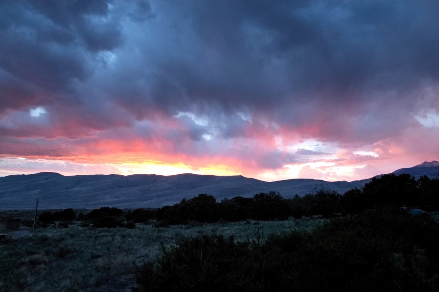 Colorful sunset over the dunes in Great Sand Dunes National Park.